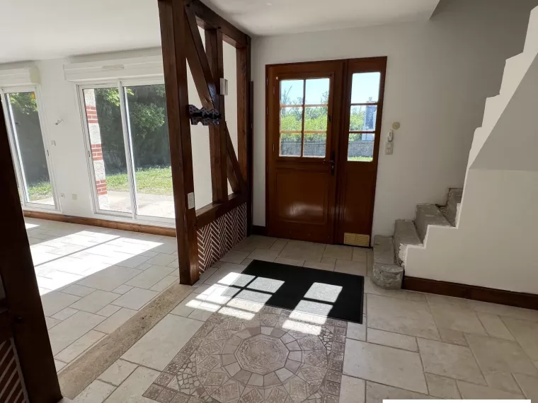 MAISON DE PLAIN PIED AVEC GRAND TERRAIN AU CALME