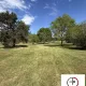 TERRAIN AGRICOLE AVEC 2 HANGARS