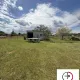 TERRAIN AGRICOLE AVEC 2 HANGARS
