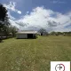 TERRAIN AGRICOLE AVEC 2 HANGARS